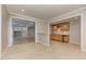 Spacious bar area featuring tile floors, counter seating, cabinetry, sink and small wine rack at 3348 Perrington Pointe, Marietta, GA 30066