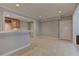 Bar area complete with tile floors, counter seating, cabinetry, sink and small wine rack at 3348 Perrington Pointe, Marietta, GA 30066