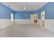 Bedroom features a blue and white color scheme, ceiling fan, and doorway to bathroom and closet at 3348 Perrington Pointe, Marietta, GA 30066