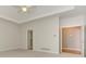 Bright bedroom featuring a tray ceiling with a ceiling fan and an open walk-in closet at 3348 Perrington Pointe, Marietta, GA 30066