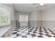 Bonus room featuring black and white tile floors, neutral paint and windows with shutters at 3348 Perrington Pointe, Marietta, GA 30066