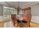 Elegant dining room featuring hardwood floors, a chandelier, and plenty of natural light at 3348 Perrington Pointe, Marietta, GA 30066