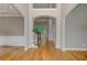Elegant foyer with hardwood floors, archways, staircase, and a view into other rooms at 3348 Perrington Pointe, Marietta, GA 30066
