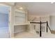 Hallway with built in desk and shelves overlooking a stairwell at 3348 Perrington Pointe, Marietta, GA 30066