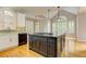Gourmet kitchen featuring granite countertops, a center island, and stainless steel appliances at 3348 Perrington Pointe, Marietta, GA 30066