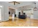 Open-concept kitchen features a center island, white cabinets and pendant lighting at 3348 Perrington Pointe, Marietta, GA 30066