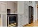 Gourmet kitchen boasts custom cabinets, stainless steel appliances and built-in wine cooler at 3348 Perrington Pointe, Marietta, GA 30066