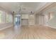 Spacious living room with hardwood floors, built-in cabinets, ceiling fan and neutral paint at 3348 Perrington Pointe, Marietta, GA 30066