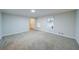 Neutral bedroom with carpet flooring, recessed lighting, and a view of the outdoors at 3480 Stillridge Dr, Alpharetta, GA 30022