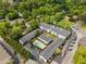 Aerial view showcases the pool, lush greenery, and parking at the complex at 3501 Roswell Ne Rd # 102, Atlanta, GA 30305
