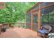 Charming deck with potted plants and comfortable seating, offering a relaxing outdoor retreat at 9900 Hunt Club Way, Johns Creek, GA 30022