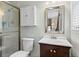 Clean bathroom with glass enclosed shower and single sink vanity at 1518 Rochelle Dr, Atlanta, GA 30338