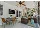 Inviting screened porch offering a seating area and a table, ideal for relaxation and entertaining at 1518 Rochelle Dr, Atlanta, GA 30338