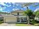 Spacious backyard featuring a large patio and a beautifully landscaped garden at 178 Mission Oak Dr, Grayson, GA 30017
