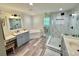 Luxurious bathroom with walk-in glass shower, soaking tub, and stylish double vanity at 178 Mission Oak Dr, Grayson, GA 30017