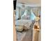Bright bedroom with white linens, natural light, and elegant furnishings at 178 Mission Oak Dr, Grayson, GA 30017