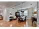Elegant dining room with hardwood floors, ample lighting, and wainscoting detail at 178 Mission Oak Dr, Grayson, GA 30017