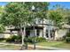 Beautiful two-story home with a inviting front porch, lush landscaping, and a well-maintained lawn at 178 Mission Oak Dr, Grayson, GA 30017