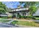 Charming two-story home with a welcoming front porch, neat landscaping and lovely curb appeal at 178 Mission Oak Dr, Grayson, GA 30017