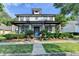 Charming two-story home with a welcoming front porch, neat landscaping and lovely curb appeal at 178 Mission Oak Dr, Grayson, GA 30017