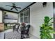 Cozy front porch featuring a porch swing, comfortable seating, and charming outdoor decor at 178 Mission Oak Dr, Grayson, GA 30017