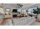 Comfortable living room with a fireplace, built-in shelving, and a cozy sitting area at 178 Mission Oak Dr, Grayson, GA 30017