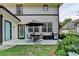 Charming patio with outdoor seating, a grill, and a landscaped yard, perfect for entertaining at 178 Mission Oak Dr, Grayson, GA 30017