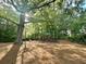 Community playground shaded by mature trees at 178 Mission Oak Dr, Grayson, GA 30017