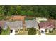 Aerial view of homes in a quiet neighborhood with mature landscaping, and private driveways at 3133 Bridge Walk Dr, Lawrenceville, GA 30044