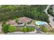 Aerial view of community amenities featuring a pool, tennis courts, and a clubhouse at 3133 Bridge Walk Dr, Lawrenceville, GA 30044