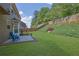 Spacious backyard with privacy fence and patio area, perfect for outdoor entertaining at 3133 Bridge Walk Dr, Lawrenceville, GA 30044