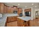 Spacious kitchen features granite countertops, stainless steel appliances and wood cabinets at 3133 Bridge Walk Dr, Lawrenceville, GA 30044