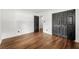 Bedroom with hardwood floors, white walls, and a large closet at 4158 Pepperdine Dr, Decatur, GA 30034