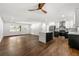 Spacious living room showcasing a modern kitchen with stainless steel appliances and a center island at 4158 Pepperdine Dr, Decatur, GA 30034