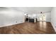 Spacious living room boasting wood-look floors with the kitchen visible in the background at 4158 Pepperdine Dr, Decatur, GA 30034