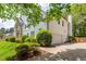 Spacious home with a two-car garage and lush landscaping, offering both convenience and aesthetic appeal at 725 Eider Down Ct, Alpharetta, GA 30022