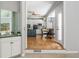 Open-concept kitchen with stainless steel appliances and eat-in dining area at 725 Eider Down Ct, Alpharetta, GA 30022