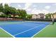Well-maintained community tennis court for residents to enjoy recreational activities and friendly matches at 725 Eider Down Ct, Alpharetta, GA 30022