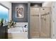 Bathroom featuring a soaking tub, and separate shower at 8268 E Carroll Rd, Whitesburg, GA 30185