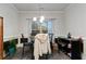 Charming dining area with decorative lighting, a window view, and stylish decor; a great place for Gathering meals at 8268 E Carroll Rd, Whitesburg, GA 30185