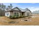 Beautiful home featuring brick accents and neat landscaping offering great curb appeal at 8268 E Carroll Rd, Whitesburg, GA 30185