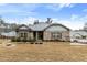 Charming single-story home with a brick facade, landscaped yard, and a welcoming covered entrance at 8268 E Carroll Rd, Whitesburg, GA 30185