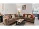 Cozy living room with comfortable seating and neutral tones, perfect for relaxing or entertaining at 8268 E Carroll Rd, Whitesburg, GA 30185