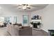 Spacious living area with a fireplace, large windows, and plenty of room for comfortable seating at 8268 E Carroll Rd, Whitesburg, GA 30185
