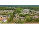 Overhead shot showcasing the lush landscaping and charming homes in this desirable residential community at 2490 Hillandale Cir, Cumming, GA 30041
