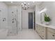 Luxurious bathroom with glass-enclosed shower, soaking tub, and double vanity at 2490 Hillandale Cir, Cumming, GA 30041