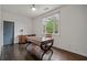 Office space with a hardwood floor and a window that provides natural light at 2490 Hillandale Cir, Cumming, GA 30041