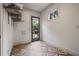 Bright room with patterned tile flooring, outdoor access, and plenty of natural light at 2490 Hillandale Cir, Cumming, GA 30041