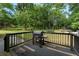 Back porch overlooking a wooded area with backyard and private setting at 4070 Lauada Dr, Douglasville, GA 30135
