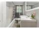 Bathroom featuring a tub, vanity, and modern fixtures at 4070 Lauada Dr, Douglasville, GA 30135